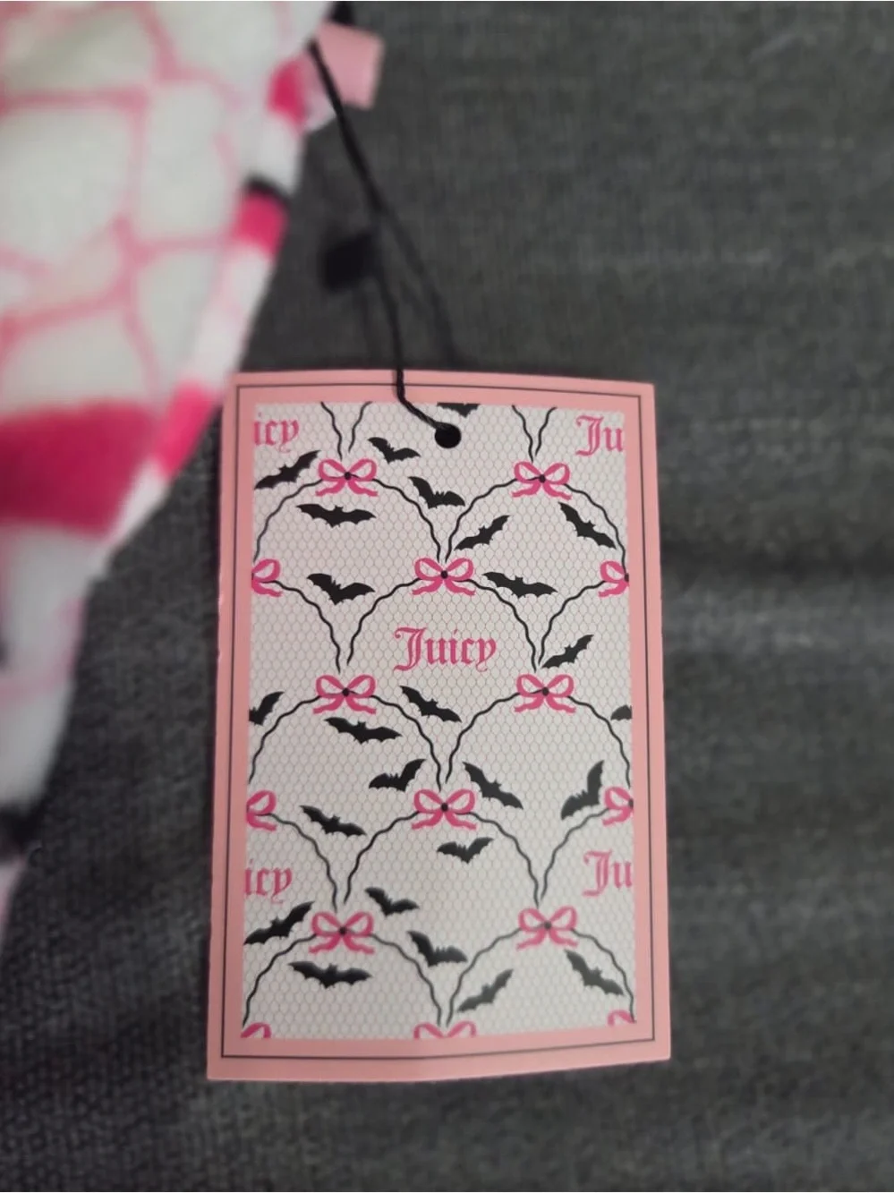 Juicy Couture pink & white blanket with black bats and pink bows #juicyblanket